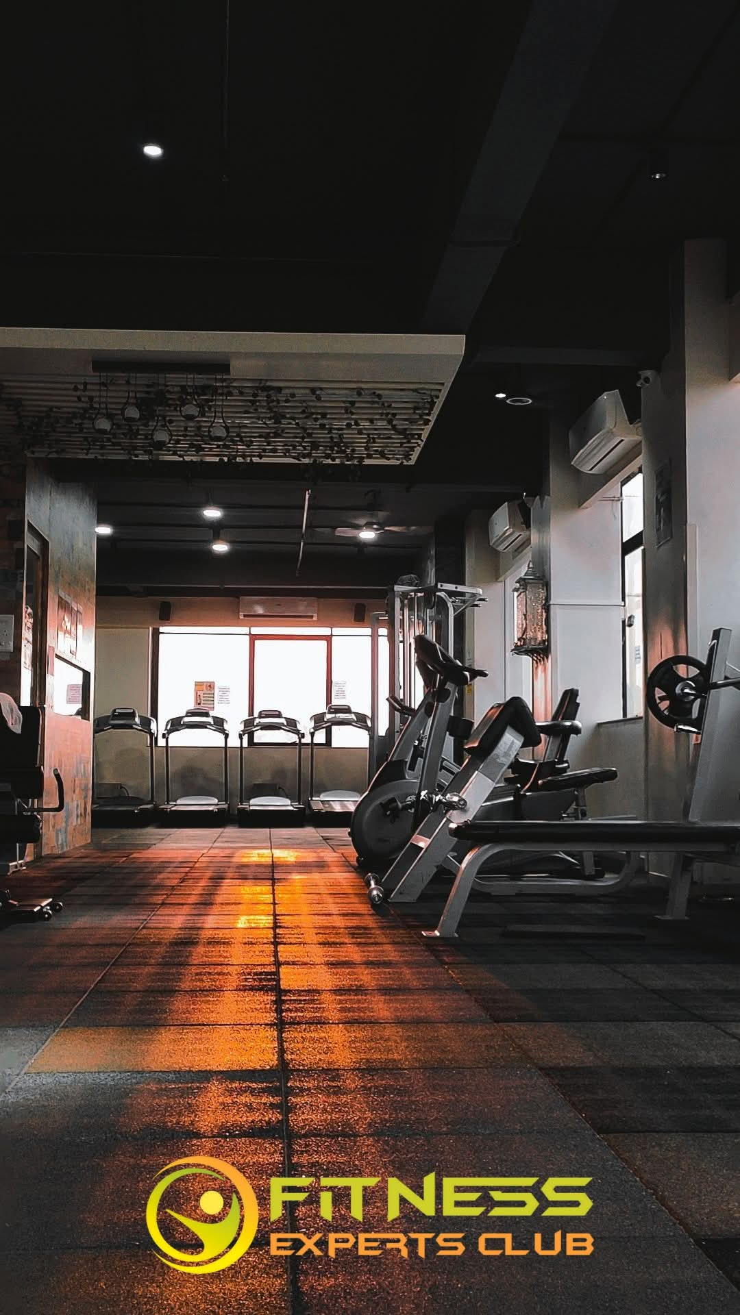 Fitness Experts Club gym floor with treadmills and strength equipment